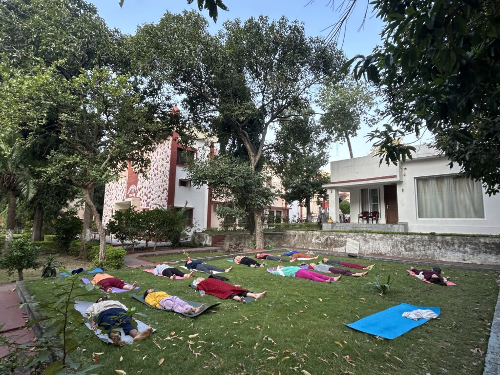 Yoga students practicing meditation at Yoga Niketan Ashram on the banks of the holy Ganga.
