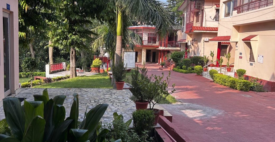 Yoga students practicing meditation at Yoga Niketan Ashram on the banks of the holy Ganga.