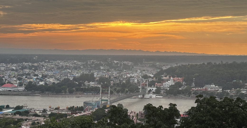 Yoga students practicing meditation at Yoga Niketan Ashram on the banks of the holy Ganga.